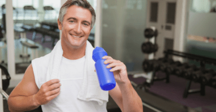 Fit Man Doing Joint Exercises in the gym