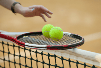 tennis racket and tennis balls