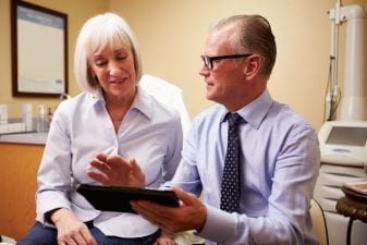 Doctor and patient talking through Lupus and Rhuematoid Arthritis