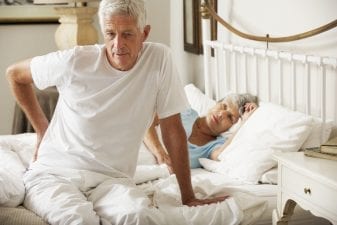 Man with lower back pain from sleeping
